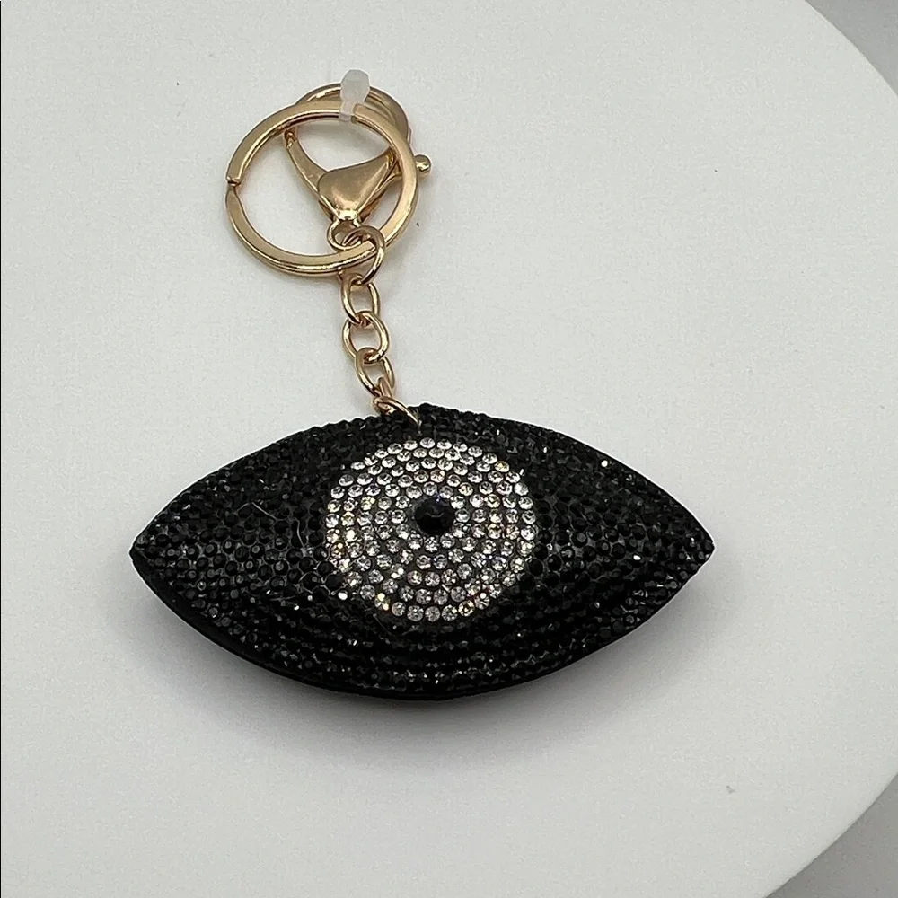 016. Black and Silver Eye Keychain with Rhinestones Gold Hardware